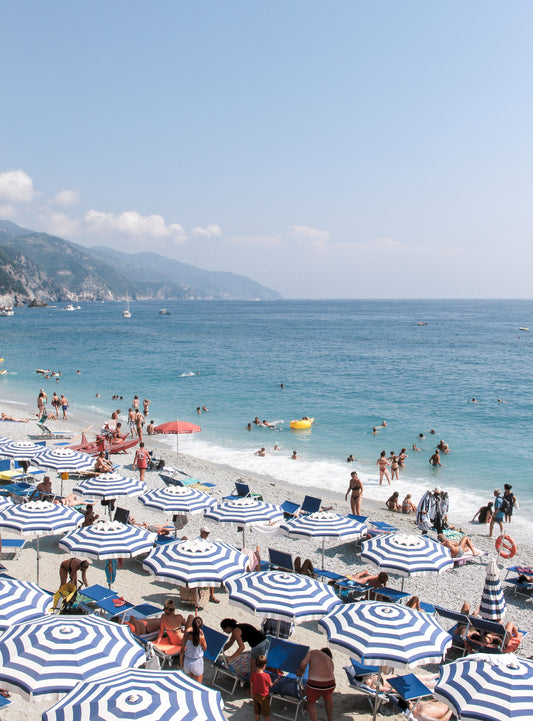 1.14 Italy, Monterosso; Blue and White Parasols